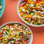 Ingredients for a dense bean salad in individual bowls