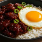 Hot honey beef bowl with egg and rice