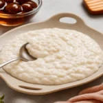 Spoonful of lactose free cottage cheese in a bowl